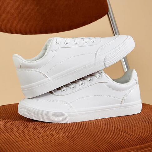 أحذية رياضية جلدية بيضاء من النفاق للنساء أحذية تنس أحذية للأزياء للنساء. in Kuwait