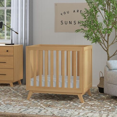 DaVinci Otto 3-in-1 Convertible Mini Crib with 4" Mattress in Walnut, Greenguard Gold Certified in Saudi Arabia