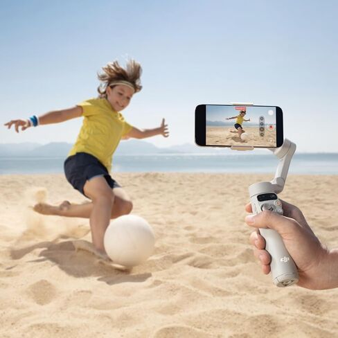 DJI Osmo Mobile 7 Gimbal Satilizer for iPhone و Android و Tripod مدمج و 3 محاور Gimbal و Activetrack 7.0 و ShotGuides ، 10 ساعات ، شحن الهاتف + شاحن محمول + مجموعة ميكروف in Saudi Arabia