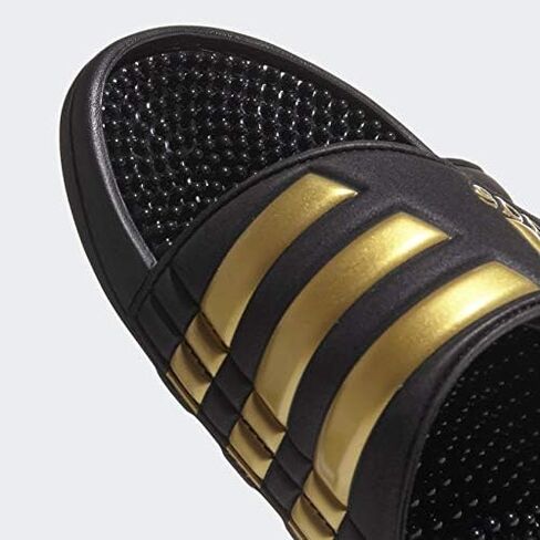 adidas Men's Adissage Slides Sandal, Black/Gold Metallic/Black, 11 in Saudi Arabia