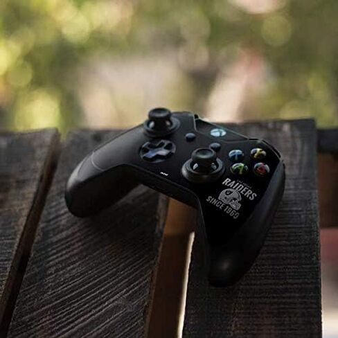 Skinit Decal Gaming Skin Compatible with Xbox One Elite Controller - Officially Licensed NFL Las Vegas Raiders Helmet Design in Saudi Arabia