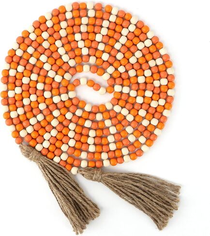 CVHOMEDECO. 16 Feet Wood Beads Garland with Tassels Farmhouse Rustic Wooden Decorative Bead String Wall Hanging Accent for Home Festival Decor. Orange in Saudi Arabia