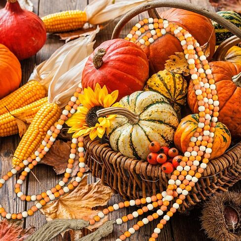 CVHOMEDECO. 16 Feet Wood Beads Garland with Tassels Farmhouse Rustic Wooden Decorative Bead String Wall Hanging Accent for Home Festival Decor. Orange in Saudi Arabia