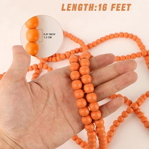 CVHOMEDECO. 16 Feet Wood Beads Garland with Tassels Farmhouse Rustic Wooden Decorative Bead String Wall Hanging Accent for Home Festival Decor. Orange in Kuwait