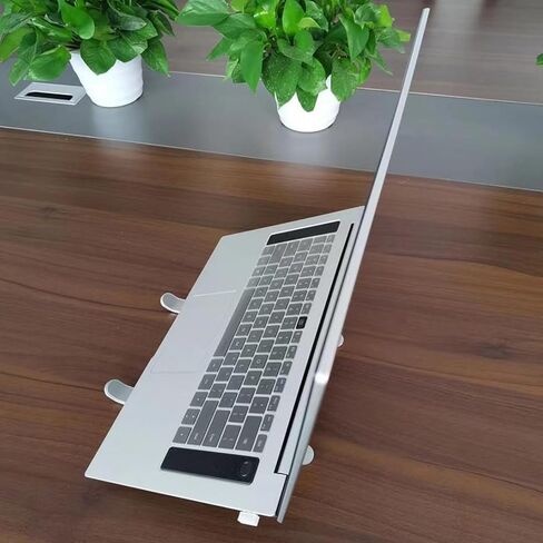 ​​Adjustable Laptop Stand - White Ergonomic Riser for Desk, Home Office & Improved Posture (360° Rotation, Foldable)​​ in Saudi Arabia
