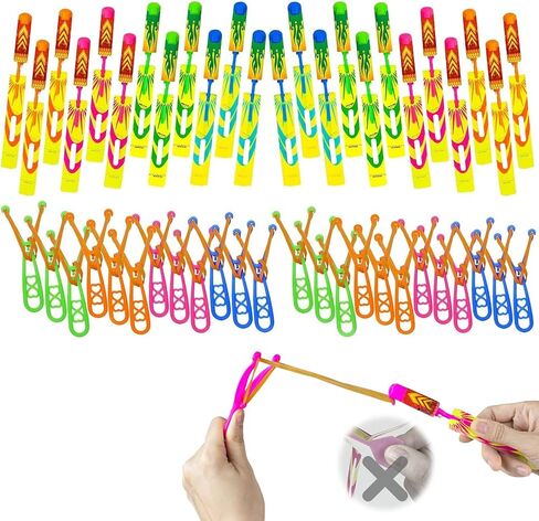 Ynybusi 50 Pcs Slingshot Outdoor Toys,Glow in The Dark Party Favor Toys Rocket with Launcher,LED Light Up Helicopter Toys,Glow Sticks Birthday Christmas Gifts Party Favors for Kids 4-8-12 Bulk Toys in Saudi Arabia