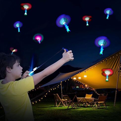 Ynybusi 50 Pcs Slingshot Outdoor Toys,Glow in The Dark Party Favor Toys Rocket with Launcher,LED Light Up Helicopter Toys,Glow Sticks Birthday Christmas Gifts Party Favors for Kids 4-8-12 Bulk Toys in Saudi Arabia