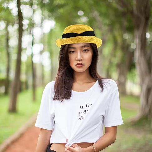 Yellow Straw Sun Hat for Women and Girls: Wide Brim Bowknot Dome Design, Foldable and Packable for Beach and Summer Adventures in Saudi Arabia