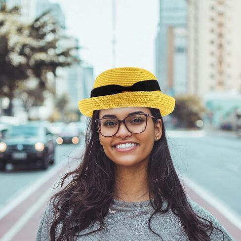 Yellow Straw Sun Hat for Women and Girls: Wide Brim Bowknot Dome Design, Foldable and Packable for Beach and Summer Adventures in Saudi Arabia