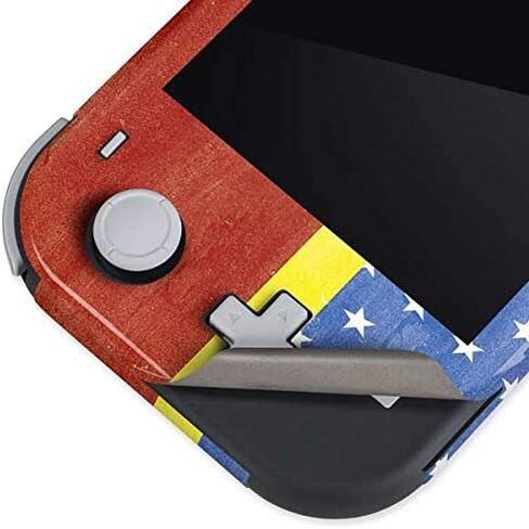 Skinit Decal Gaming Skin Compatible with Nintendo Switch Lite - Officially Licensed DC Comics Wonder Woman Logo Pattern Design in Saudi Arabia