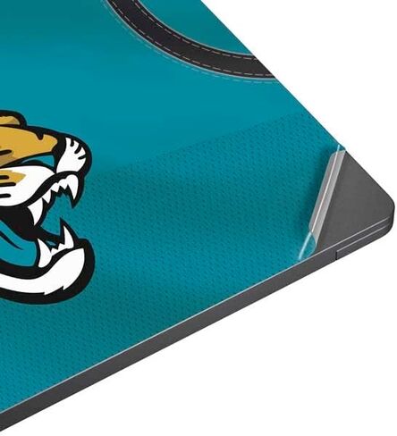 Skinit Skinit Leach Captop Skin متوافق مع جهاز الكمبيوتر المحمول السطحي 7 13.8in - تصميم فريق NFL Jaguars المرخص رسميًا in Saudi Arabia