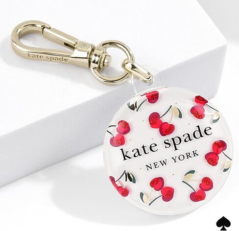 حامل Kate Spade New York Airtag مع مقطع خاتم ذهبي - حالة وقائية لـ Apple Airtag - Dot Cherry in Saudi Arabia