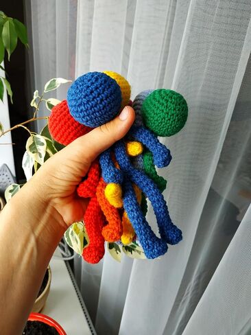 Crocheted Stick Figures, with flexible body, Amigurumi doll, 100% handmade, unique and original gift (green) in Saudi Arabia