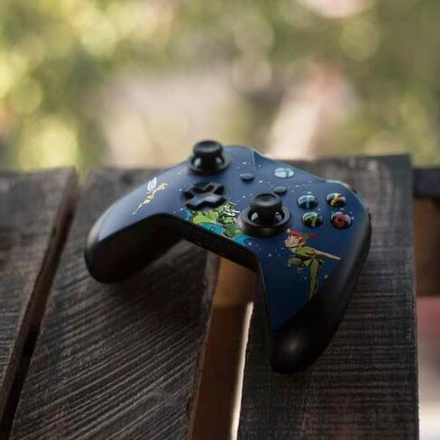 Skinit Skinit Gaming Gaming Skin متوافق مع جهاز التحكم في Xbox One S - ديزني بيتر بان وعبث بيل في نيفرلاند. in Saudi Arabia