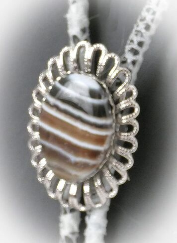 This Bolo Has A Black, Brown and White Piece of Banded Agate Which Sits in the Silver-Plated Wire Bezel With Suede Cord and Sterling Silver Tips in Saudi Arabia