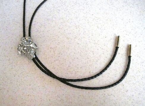 Man's Southwestern Bolo Tie featuring Pyrite or Fool's Gold with Black Leather Cords and Gold Tone Tips in Saudi Arabia
