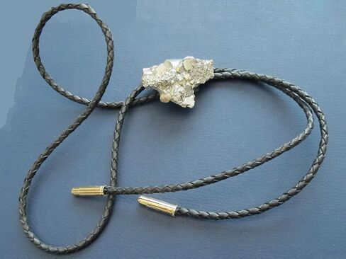 Man's Southwestern Bolo Tie featuring Pyrite or Fool's Gold with Black Leather Cords and Gold Tone Tips in Saudi Arabia