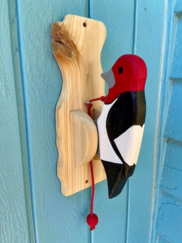 Red-headed woodpecker door knocker in Saudi Arabia