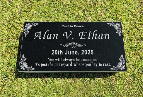 A personalized headstone made of black granite that honors loved ones forever. Wing designed headstone in Saudi Arabia