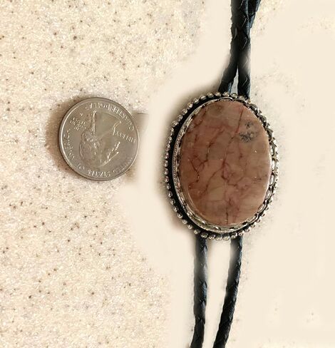 This Bolo Tie Has a Butterfly Jasper Stone Set in a Silver Tone Bezel with a Black Leather Cord and PewterTips. in Saudi Arabia