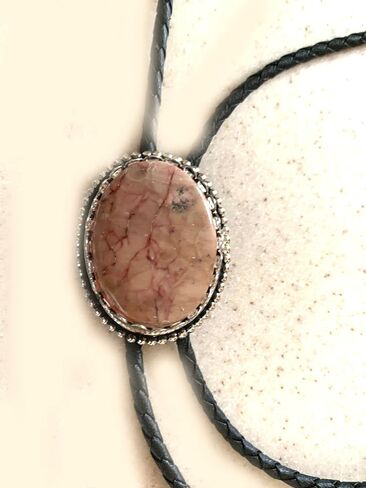 This Bolo Tie Has a Butterfly Jasper Stone Set in a Silver Tone Bezel with a Black Leather Cord and PewterTips. in Saudi Arabia