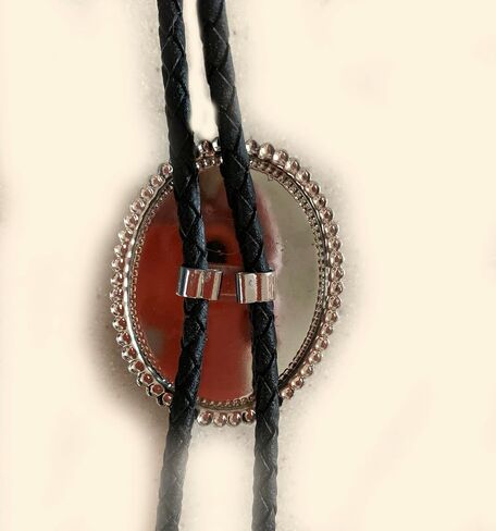 This Bolo Tie Has a Butterfly Jasper Stone Set in a Silver Tone Bezel with a Black Leather Cord and PewterTips. in Saudi Arabia