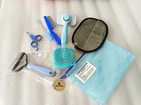 9-in-1 Pet Grooming Kit, Self-Cleaning Slicker Brush, Deshedding Rake, Lint Remover, Nail Clipper & More, Complete Cats & Dog Care Set. in Saudi Arabia