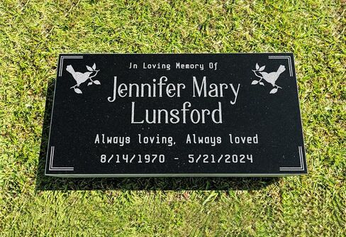A personalized headstone made of black granite that honors loved ones forever. in Saudi Arabia