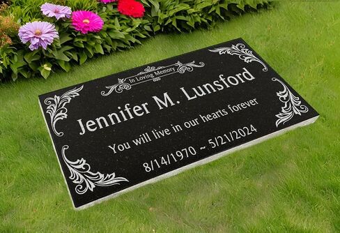 A personalized headstone made of black granite that honors loved ones forever. corners floral designed headstone in Saudi Arabia