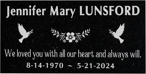 A personalized headstone made of black granite that honors loved ones forever. corners floral designed headstone in Saudi Arabia