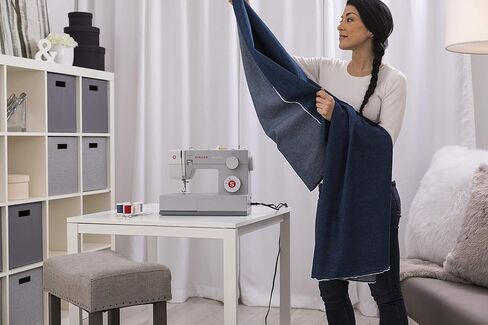 Singer | Heavy Duty 4411 Sewing Machine with 11 Built-in Stitches, Metal Frame and Stainless Steel BedPlate, Great for Sewing all Fabrics (Renewed) in Kuwait