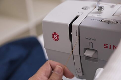 Singer | Heavy Duty 4411 Sewing Machine with 11 Built-in Stitches, Metal Frame and Stainless Steel BedPlate, Great for Sewing all Fabrics (Renewed) in Kuwait