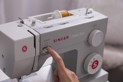 Singer | Heavy Duty 4411 Sewing Machine with 11 Built-in Stitches, Metal Frame and Stainless Steel BedPlate, Great for Sewing all Fabrics (Renewed) in Kuwait