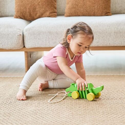 PlanToys Penguin Wheelie Push Toy for Toddlers - Sustainably Made from Rubberwood Featuring Organic-Pigment Coloring and Water-Based Dyes with Waddling Action When Pushed in Saudi Arabia