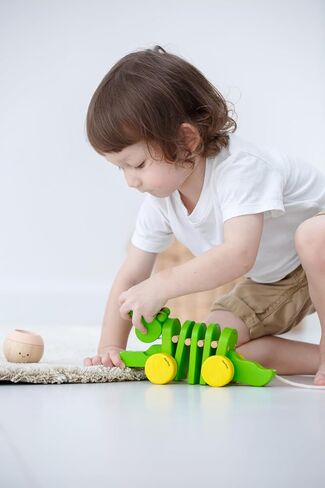 PlanToys Penguin Wheelie Push Toy for Toddlers - Sustainably Made from Rubberwood Featuring Organic-Pigment Coloring and Water-Based Dyes with Waddling Action When Pushed in Saudi Arabia