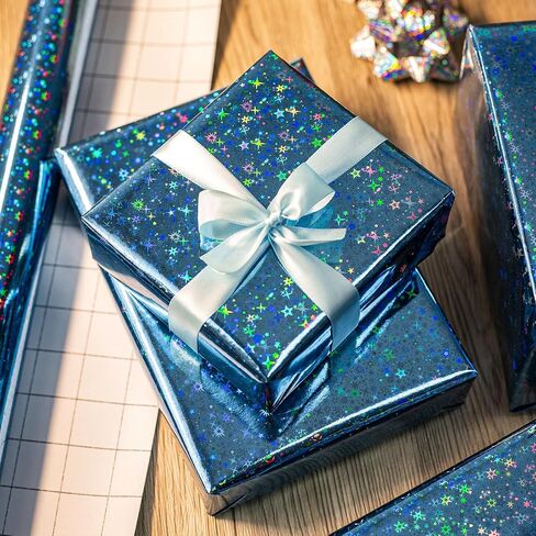 Merture Blue Holographic Paper Roll ، لف هدايا الفضاء الأزرق مع تصميم مجرة ​​مشرقة لعيد الميلاد ، استحمام الطفل ، عيد الميلاد ، عيد الأب ، الأعشاب الضارة - 17 في × 32.8 قدم (46.5 قدم مربع) in Kuwait