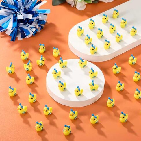 Geelin 100 Pcs Mini Resin Cheer Ducks Gifts Bulk Tiny Duck Figurines with Bows and Pom Pom for Cheerleader Team Gift DIY Decoration Craft in Saudi Arabia