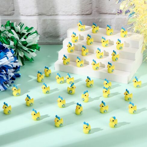 Geelin 100 Pcs Mini Resin Cheer Ducks Gifts Bulk Tiny Duck Figurines with Bows and Pom Pom for Cheerleader Team Gift DIY Decoration Craft in Saudi Arabia