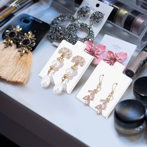 NBEADS 100 Pcs Earring Display Cards, PVC Jewelry Hanging Display Cards Puff Earring Cards Earring Holder Cards with Paper Packaging Box for Earrings Jewelry Display, White, 1.2x1Inch in Saudi Arabia