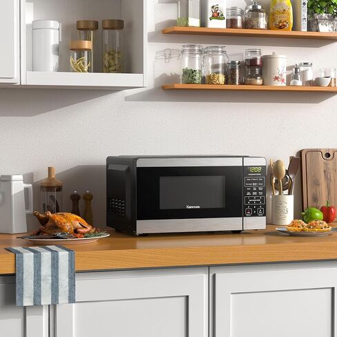 Kenmore KMCMWP11S2-10 Countertop Microwave 6 Auto-Preset Menus, Child Lock, Defrost & Express Cooking Features, 1.1 Cu Ft, Stainless Steel 1000W in Saudi Arabia
