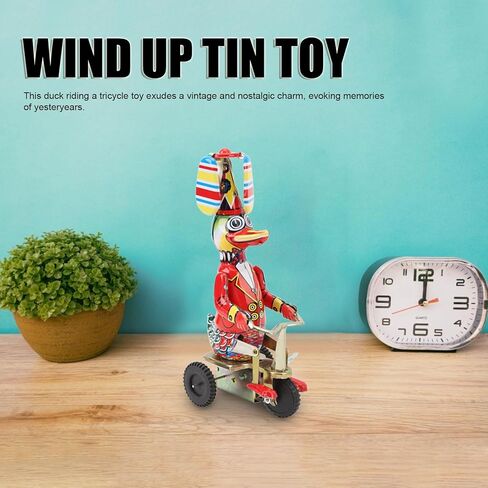 بطة على TIN TOY TOY CLOCKWORK RETRO RONT UP TOY COWN COLLESTER in Kuwait