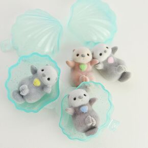 Adorable Sea Otter Collectible Figures in Shell Capsules – 4 Poseable Kawaii Flocky PVC Toys (Peaches, Yuzu, Sky, Marimo) for Desk Decor & Display in Saudi Arabia