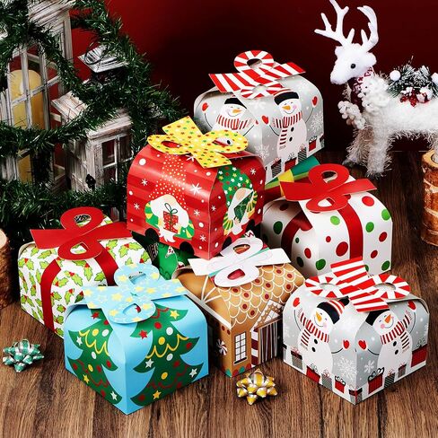 JOYIN 24 PCS 3D Christmas Goody Gift Boxes with Bow for Holiday Xmas Goodie Paper Boxes, School Classroom Party Favor Supply, 6" x 6" x 5.5" 8 Designs Candy Treat Cardboard Cookie Box for Gift Giving in Saudi Arabia