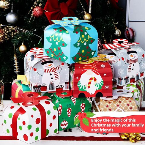 JOYIN 24 PCS 3D Christmas Goody Gift Boxes with Bow for Holiday Xmas Goodie Paper Boxes, School Classroom Party Favor Supply, 6" x 6" x 5.5" 8 Designs Candy Treat Cardboard Cookie Box for Gift Giving in Saudi Arabia
