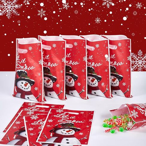 Ahysuet 50pcs Bagn Christmas Goodie Bag ، حفلات الهدايا لحفلات عيد الميلاد مع مقابض لحفلات العطلات. in Saudi Arabia