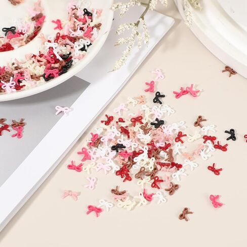 PATIKIL 100Pcs Bow Nail Charms, 0.2" Cute Resin Mini Bows Decorations 3D Nail Bowknot for Birthday Party DIY Crafts Phone Case Jewelry Decoration, Pink in Saudi Arabia