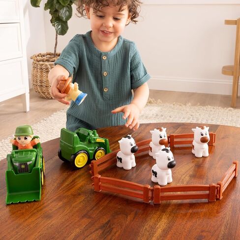 TOMY The Cows are Out! Farm Playset for Kids - Toddler Farm Set includes John Deere Tractor Toys with Front Loaders, Fencing, 2 Farmer Action Figures, and 4 Cow Toys - 14 Count - Ages 18 Months and Up in Saudi Arabia