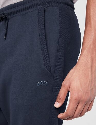 BOSS Men's Curved Logo Regular Fit Cuffed Sweatpants in Kuwait