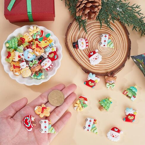SUNNYCLUE 64Pcs 16 Styles Christmas Resin Flatback Charms Holiday Cabochons Assorted Winter Xmas Tree Santa Claus Socking Deer Snowman Cabochon for DIY Crafting Jewelry Making Embellishments Supplies in Saudi Arabia