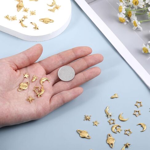 42 PCS Cosmos Themed Resin Fillers 7 Shapes Gold Zinc Alloy Star Moon Planet Spaceship Filling Accessories, Planet Charms Beads Metal Mini Decorations for Epoxy Resin Craft Jewelry Making in Saudi Arabia